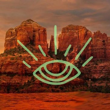 Prana viewing symbol over Sedona red rocks at sunset