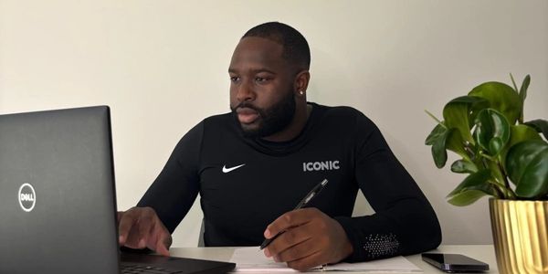 Iconic Football Academy video analyst reviewing post-match football (soccer) game