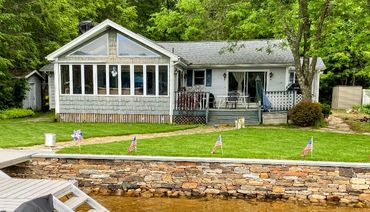Stone retaining wall on lake in Holland, MA