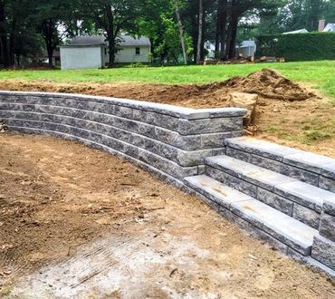 Stone retaining wall and steps