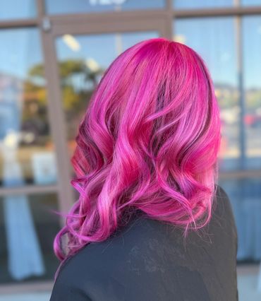 Client with Vivid color pink highlights at the Hair Salon in SCV