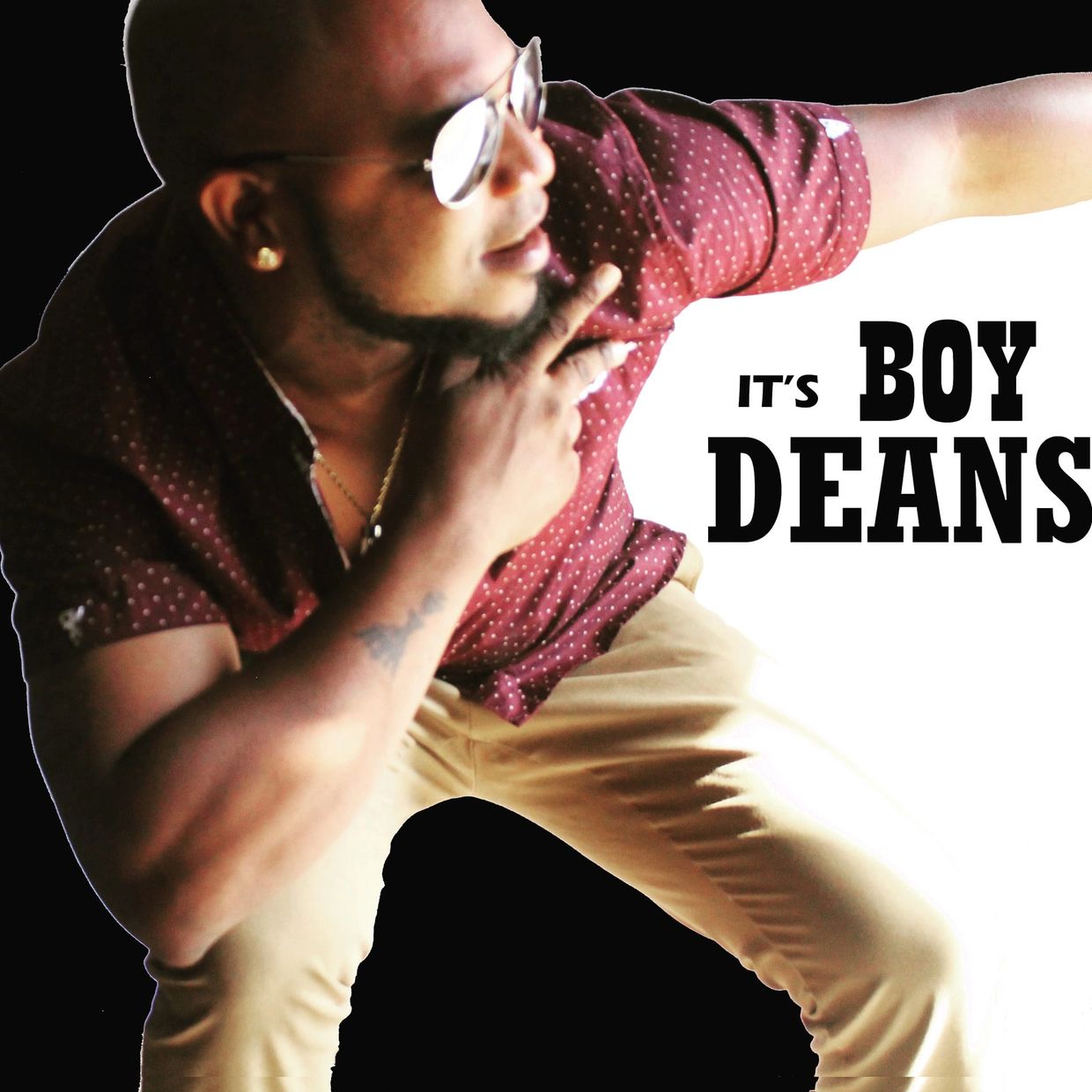 Man in sunglasses and maroon shirt posing, text reads 'It's Boy Deans'.