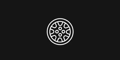 White car wheel icon on black background.
