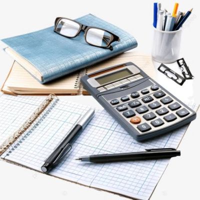 Calculator, notebooks, pens, glasses, and clips on a white surface.