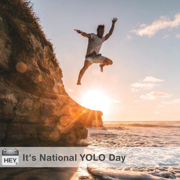 national yolo day, man jumping off cliff into ocean
