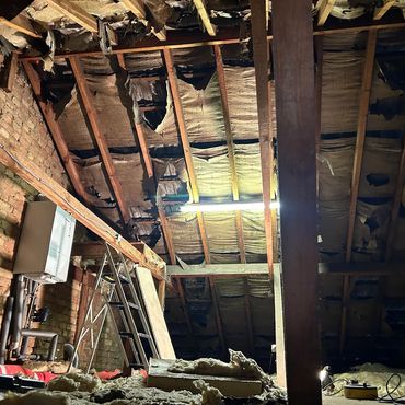 Old roof lining tar paper degraded, needs replacing before applying the spray foam insulation.