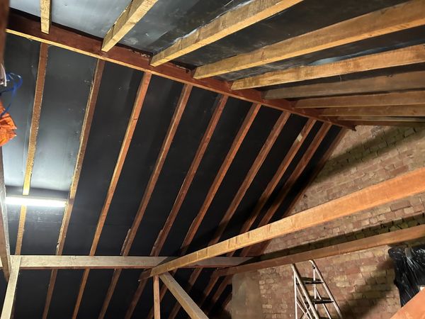 New roof lining inserted before the spray foam application