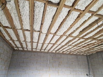 Insulation applied between ceiling joists for great insulating properties and sound proofing.