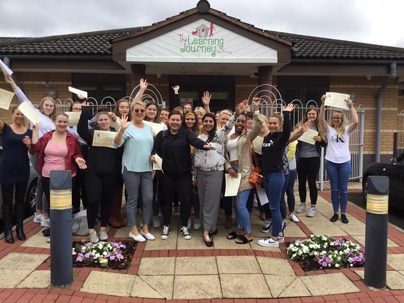 Learning journey nursery, happy staff with Deborah during a training day