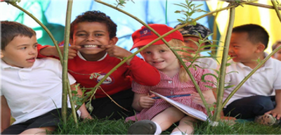 four happy children playing together