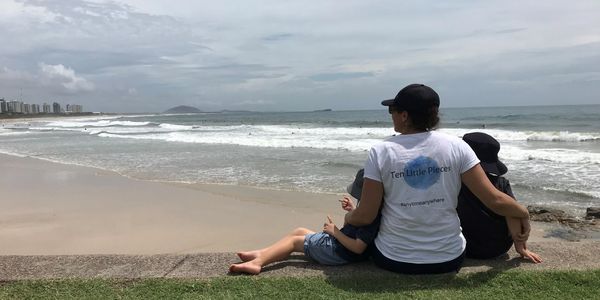 Ten Little Pieces founder & her children Alexandra Headland watching surf start where you are