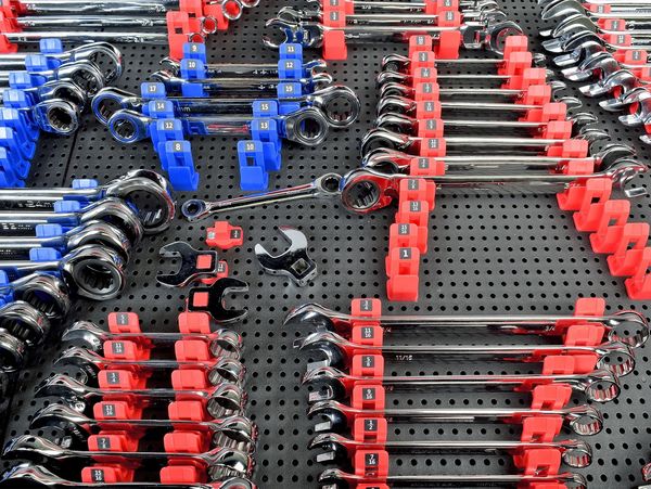 wrench holder set-up with wrenches on it on a toolgrid board