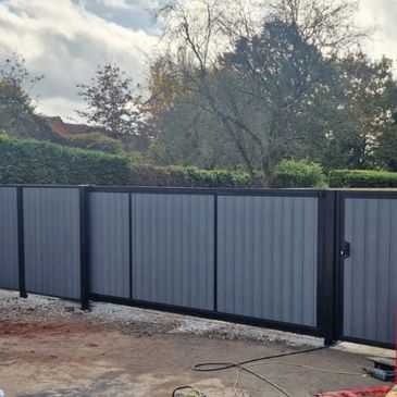 Composite driveway gates in sliding and swing Gloucestershire & Bristol and oxfordshire