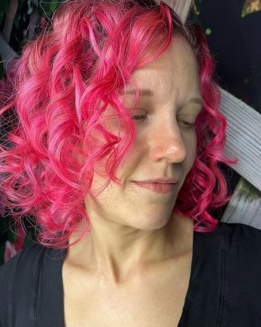 Pink color on curly hair