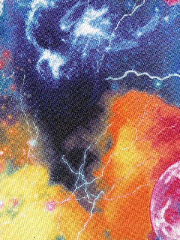 A multi-color galaxy print on blue fabric.