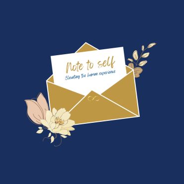 Elegant note card in a golden envelope with floral design.