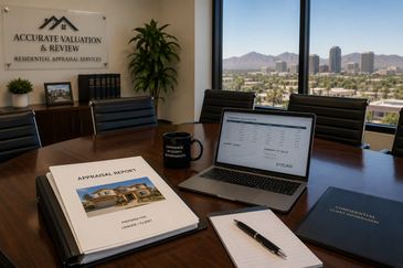 Professional residential appraisal office in Phoenix with appraisal reports and property valuation analysis.
