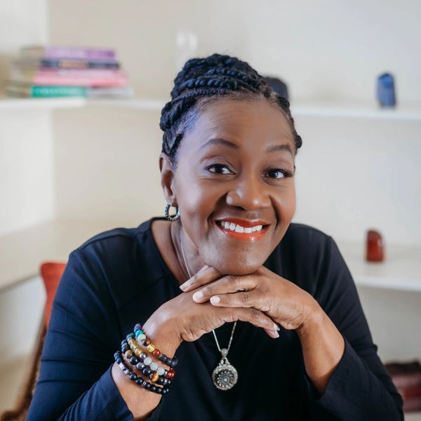 TE Anderson smiling headshot image