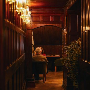 Private dining room at Yemen Heaven, York — warm wood-panelled setting for Christmas parties and corporate bookings.