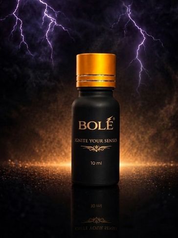 Black and gold bottle with lightning in the background.