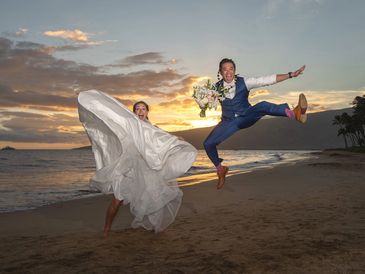Jumping for Joy on Maui after their ceremony.