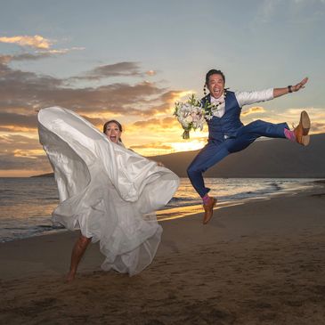Jumping for Joy on Maui after their ceremony.