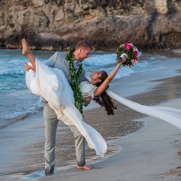 Taking a dip on the beach in Maui.