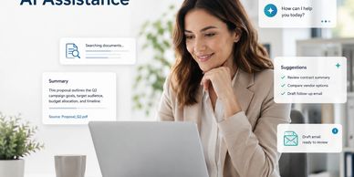 Woman using AI assistant software on laptop with helpful suggestions.