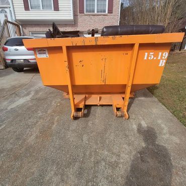 15 yard dumpster at a customers house ready for pickup