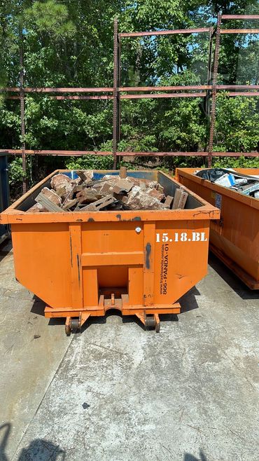 15 yard dumpster filled with concrete