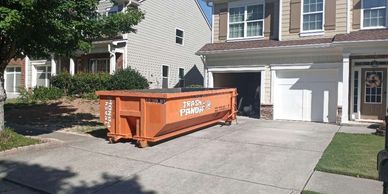 15 yard dumpster on 1 side of driveway