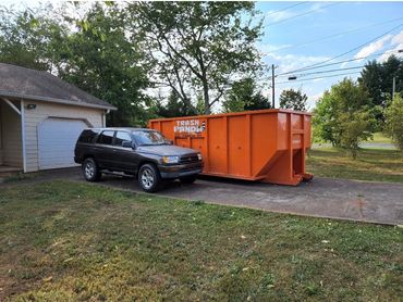 30 yard dumpster rental in Duluth, GA. Trash Panda dumpster fits in driveway and allows car to park