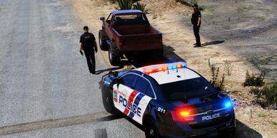 Officer's on a traffic stop on the side of the road