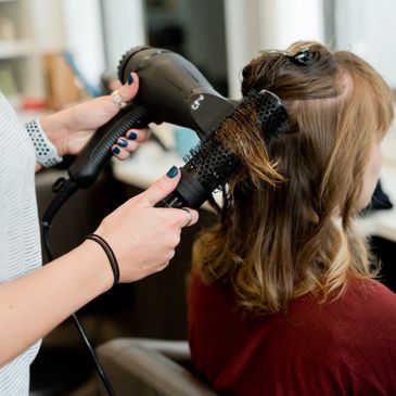 women's haircut and blow dry services
