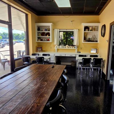 a sneak peak inside The Latte Room with large windows.