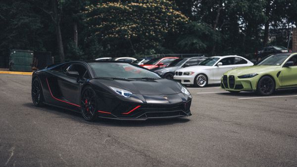 Lamborghini Aventador leaving BMW meetup at Wolfpen Euro auto repair in Roswell, GA