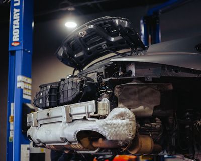 Porsche 911 receiving aftermarket exhaust at Wolfpen in Atlanta, Georgia