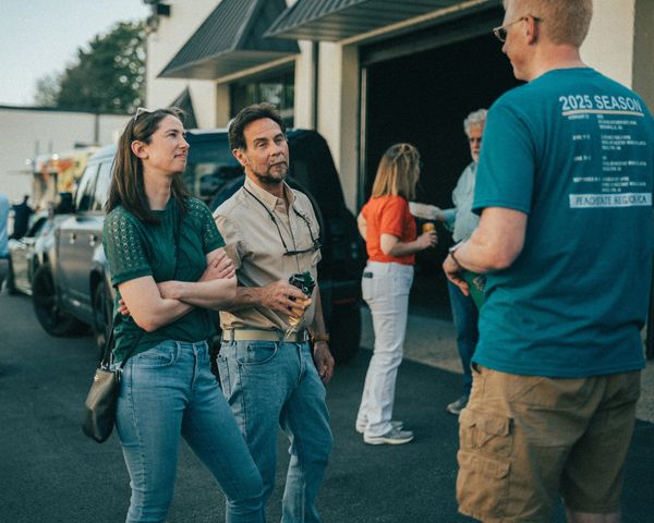 Guests outside Wolfpen European Auto Repair in Roswell Georgia enjoying the Porsche club meeting
