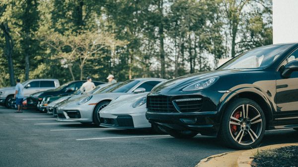Lineup of Porsche vehicles outside Wolfpen European Auto Repair in Roswell, Georgia for club meet