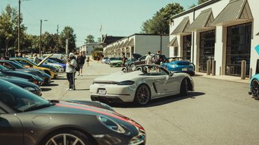 Porsche Boxster Spyder pulling out of Sundays at Wolfpen car show at Wolfpen in Roswell