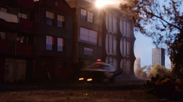 A police barrowcar races through the streets of Mibukiville.