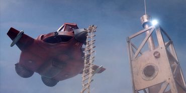 Miikshi's Hay Ewe jet plane hovers overhead lowering a safety ladder.