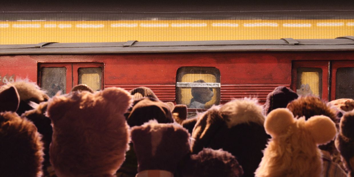 A crowd gathers at Pig-Stuy Station