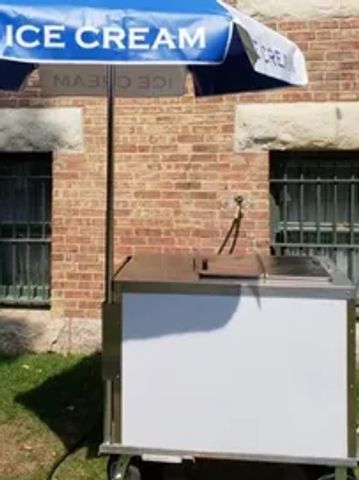 Rent commercial grade ice cream cart  with umbrella  for Chicago events.