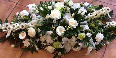 Coffin spray of white flowers