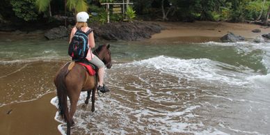 Drake Bay Horseback riding on the beach.