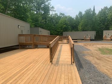 2500 sq ft of decking built of student housing at Newport Adventure Camp in Huntsville Ontario. Incl