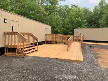 2500 sq ft of decking built of student housing at Newport Adventure Camp in Huntsville Ontario. Incl