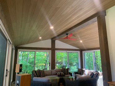 2 Diiferent types and styles of tongue and groove siding and trim work on a year round porch on Lake