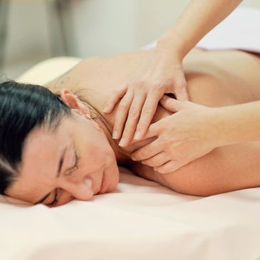 Soft tissue release massage applying pressure and stretch to reduce muscle tension in Chingford.